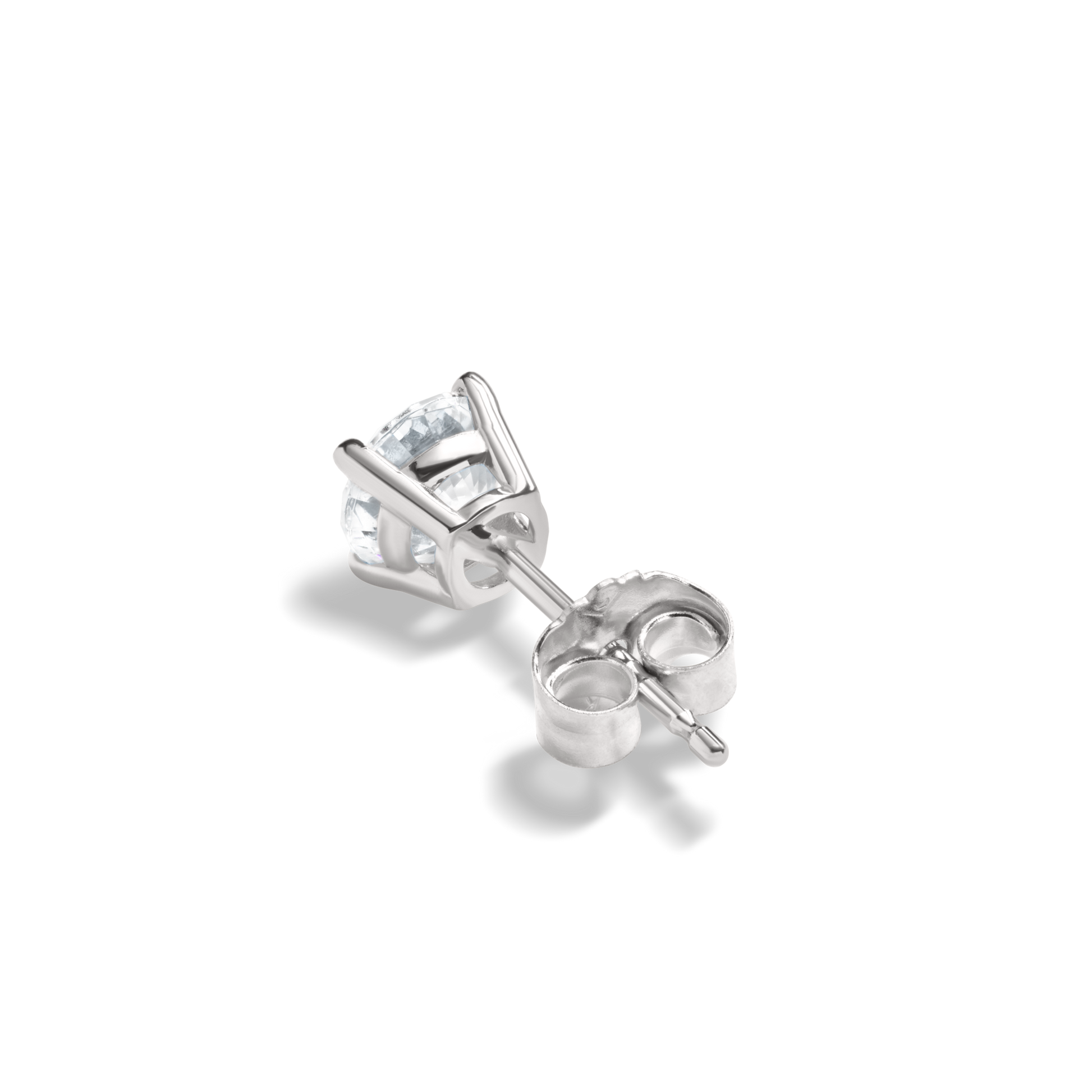 A close-up of Shinola's 1 Carat Round Diamond Studs in white gold, featuring a sparkling gemstone, shown from the back on a plain white background.