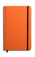 The Shinola Medium Hard Ruled Journal in Bold Orange features a closed orange hardcover, black elastic band, and matching orange ribbon bookmark, photographed on a plain white background.