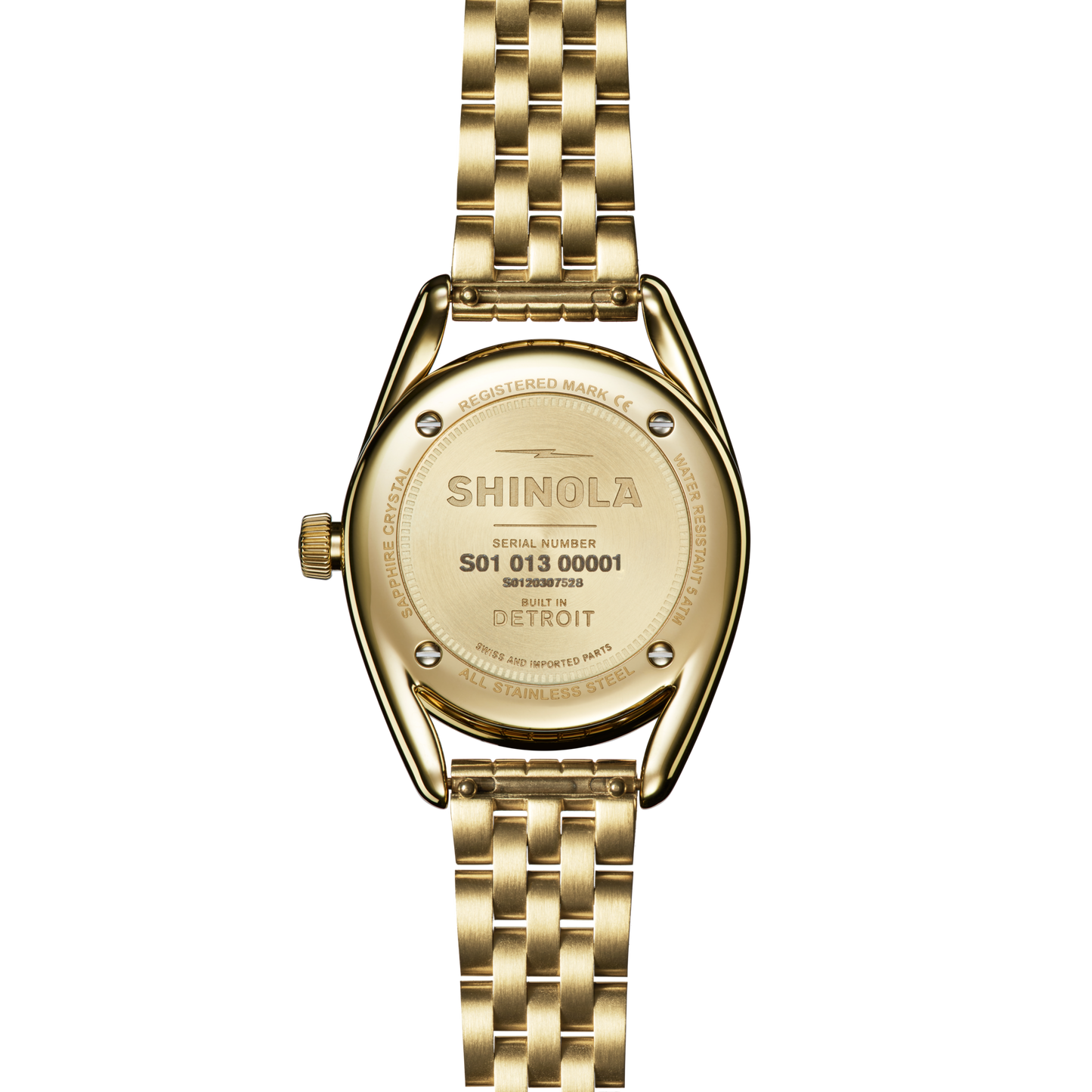 The Shinola Derby Watch - Malachite is shown from the back, featuring its engraved gold stainless steel case, visible serial number, Detroit craftsmanship, and Detroit branding on the gold link bracelet.