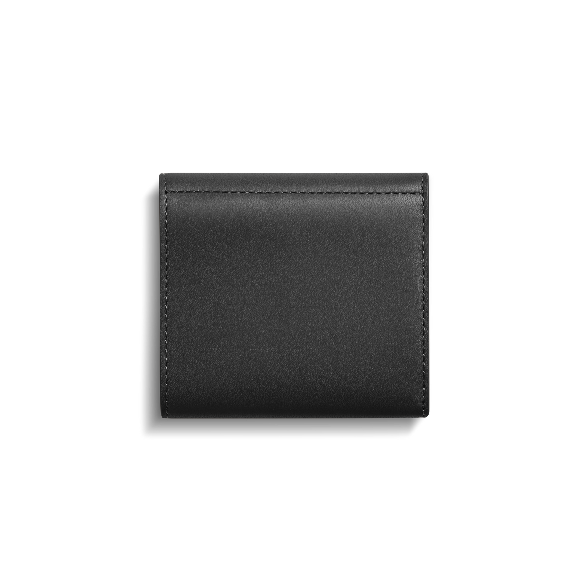 The Shinola Birdy Small Snap Wallet in black leather features neat stitching and practical card pockets, shown closed against a plain white background.