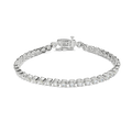 The Shinola 4 Carat 7" Diamond Tennis Bracelet in white gold showcases a row of brilliant round diamonds and a secure box clasp, elegantly displayed against a plain white background.
