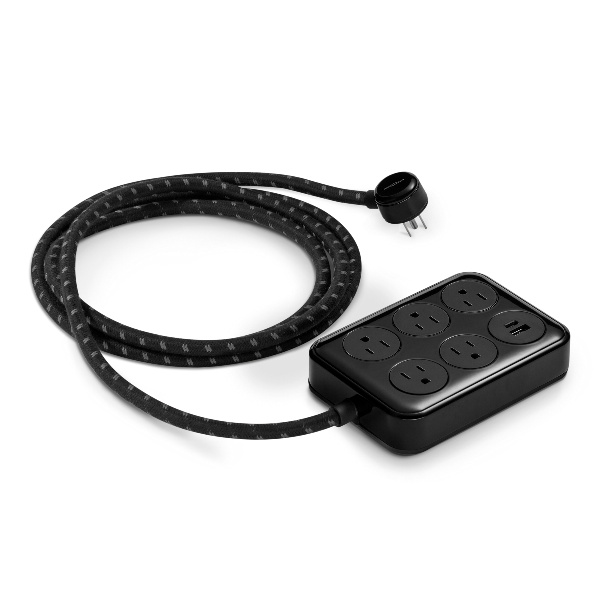 The Shinola 5 Port Power Supply in black, featuring a custom braided extension cord, six outlets, and USB-A/USB-C charging ports, is displayed on a white background.