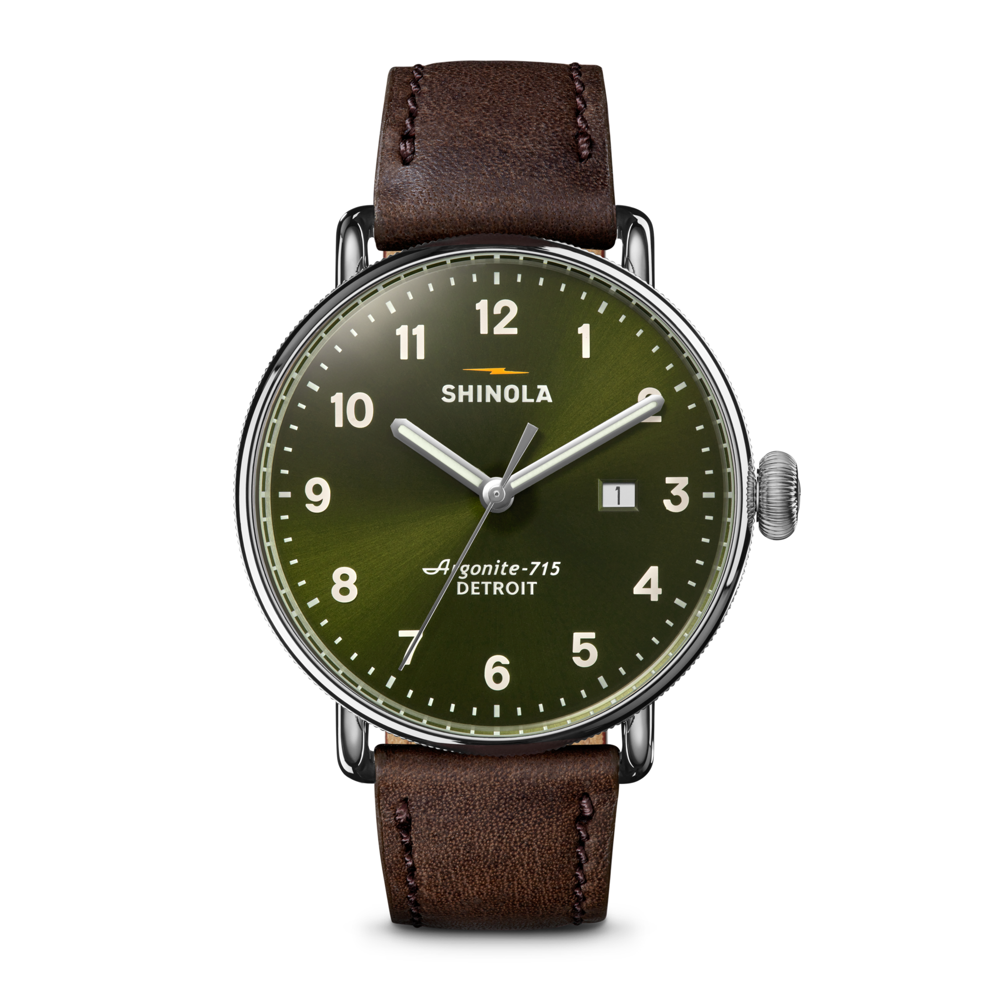 The Shinola Canfield Watch - Dark Olive features a green dial with white numerals, a brown leather strap, stainless steel case, Argonite-715 movement, a date window between 3 and 4 o’clock, and “DETROIT” branding.