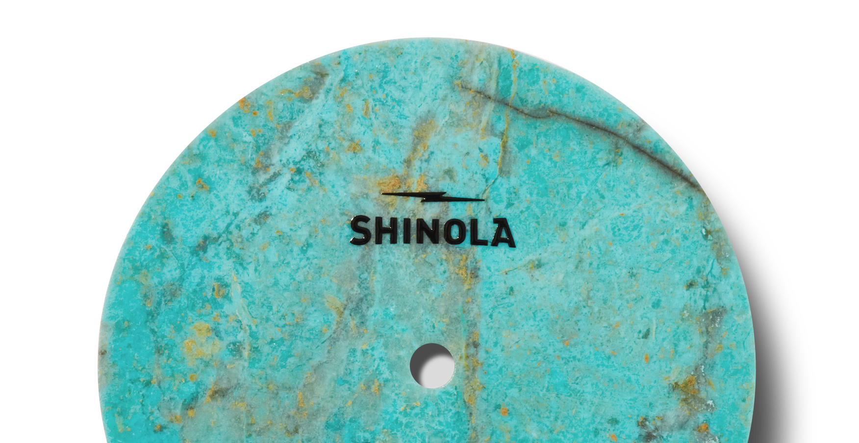 The Shinola Birdy Watch - Chrysocolla features a turquoise and gold marbled circular surface, echoing the signature style of the Birdy Collection.