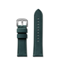 The Shinola 24mm Evergreen Leather Watch Strap in green features a silver buckle, two loops, and visible stitching. Displayed in two pieces on a plain white background, it’s perfectly sized for the 41.5mm Guardian.