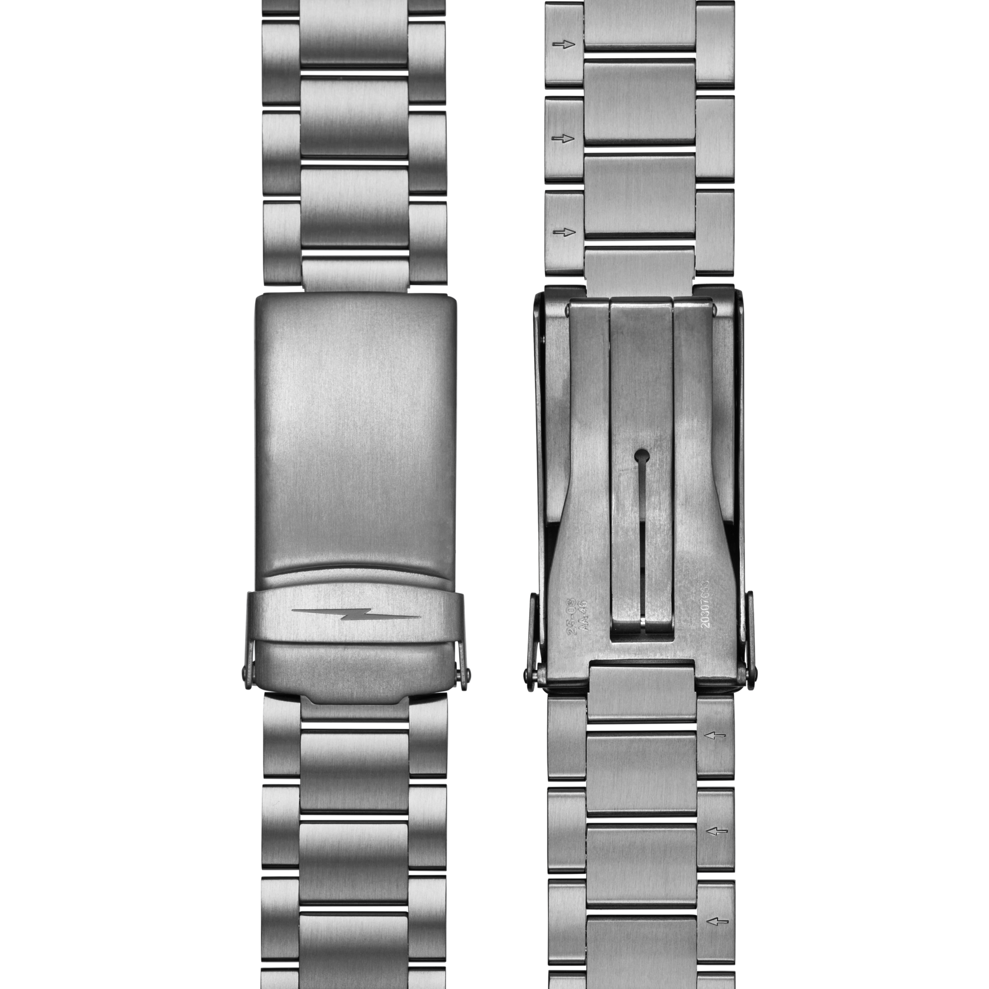 Two stainless steel watch bands from the Shinola Runwell Chronograph West Wind Gift Set are side by side: the left shows the clasp’s top, and the right reveals the 42mm chronograph’s underside mechanism, all against a white background.