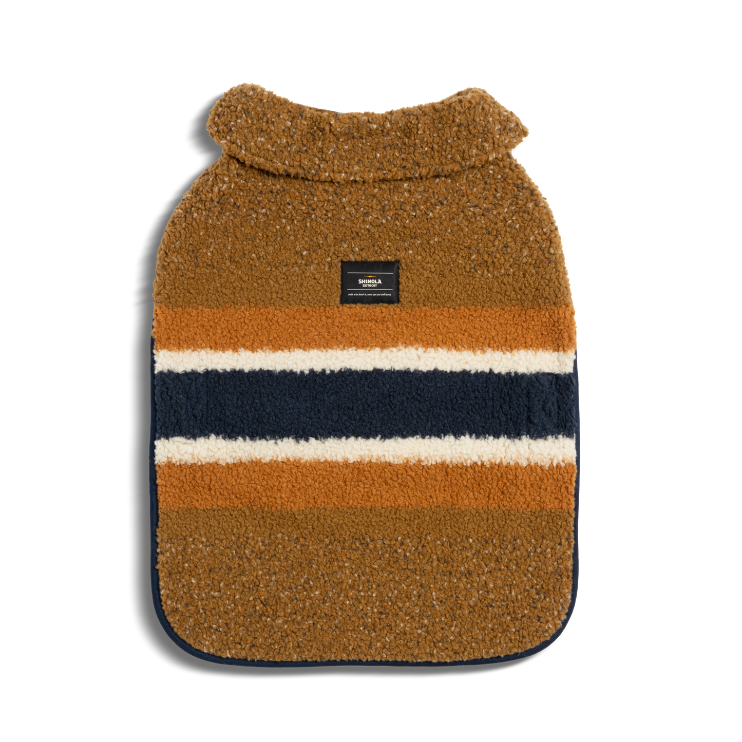 The Shinola Dog Coat - Brand Stripe / Tan is a brown, fuzzy premium sweater with wide white, navy blue, and light brown stripes plus a small black label by the collar, shown flat on a light background.
