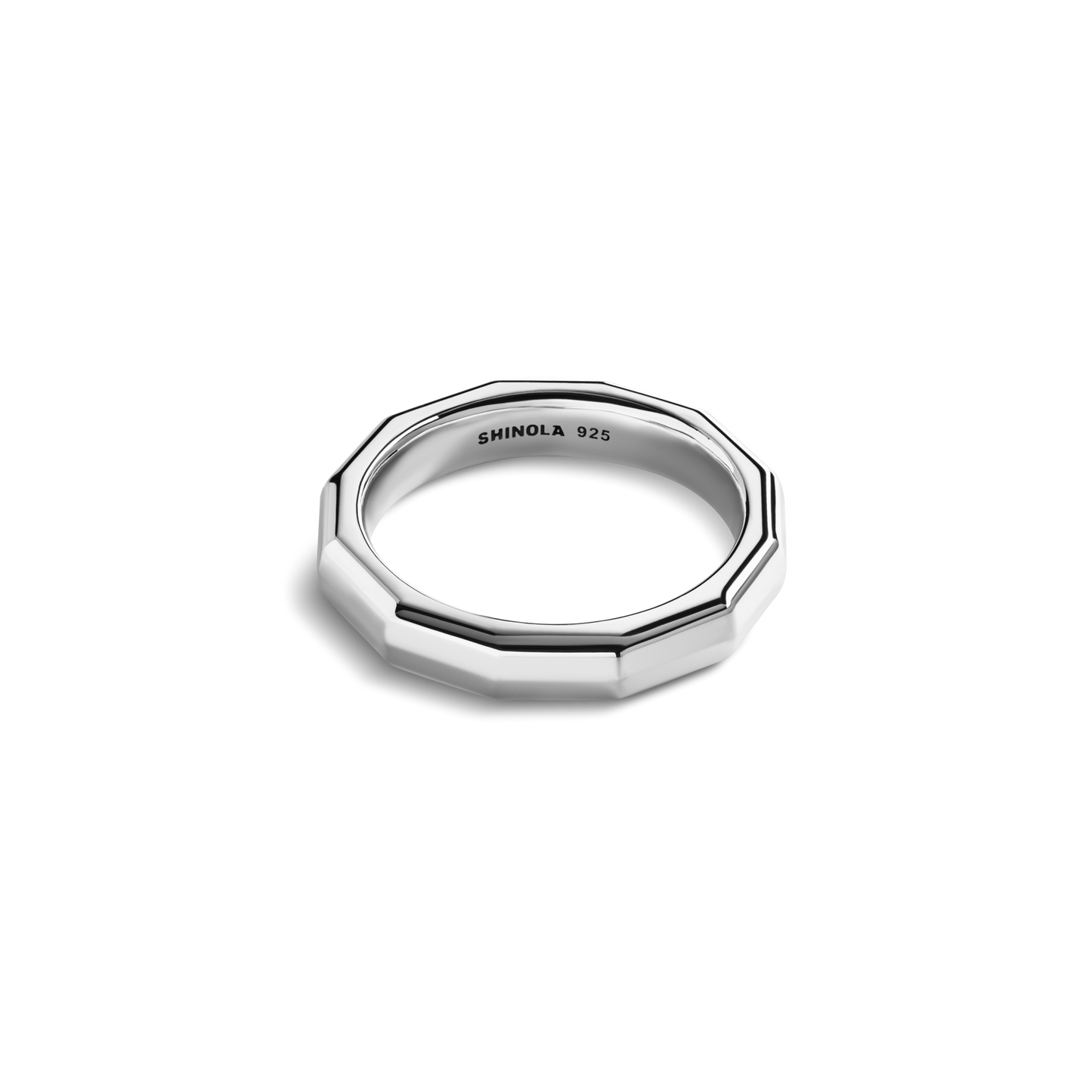 The Shinola 5mm Geometric Band is a sterling silver octagonal ring engraved with SHINOLA 925 on the inner side, showcased against a white background—a sleek modern accessory.
