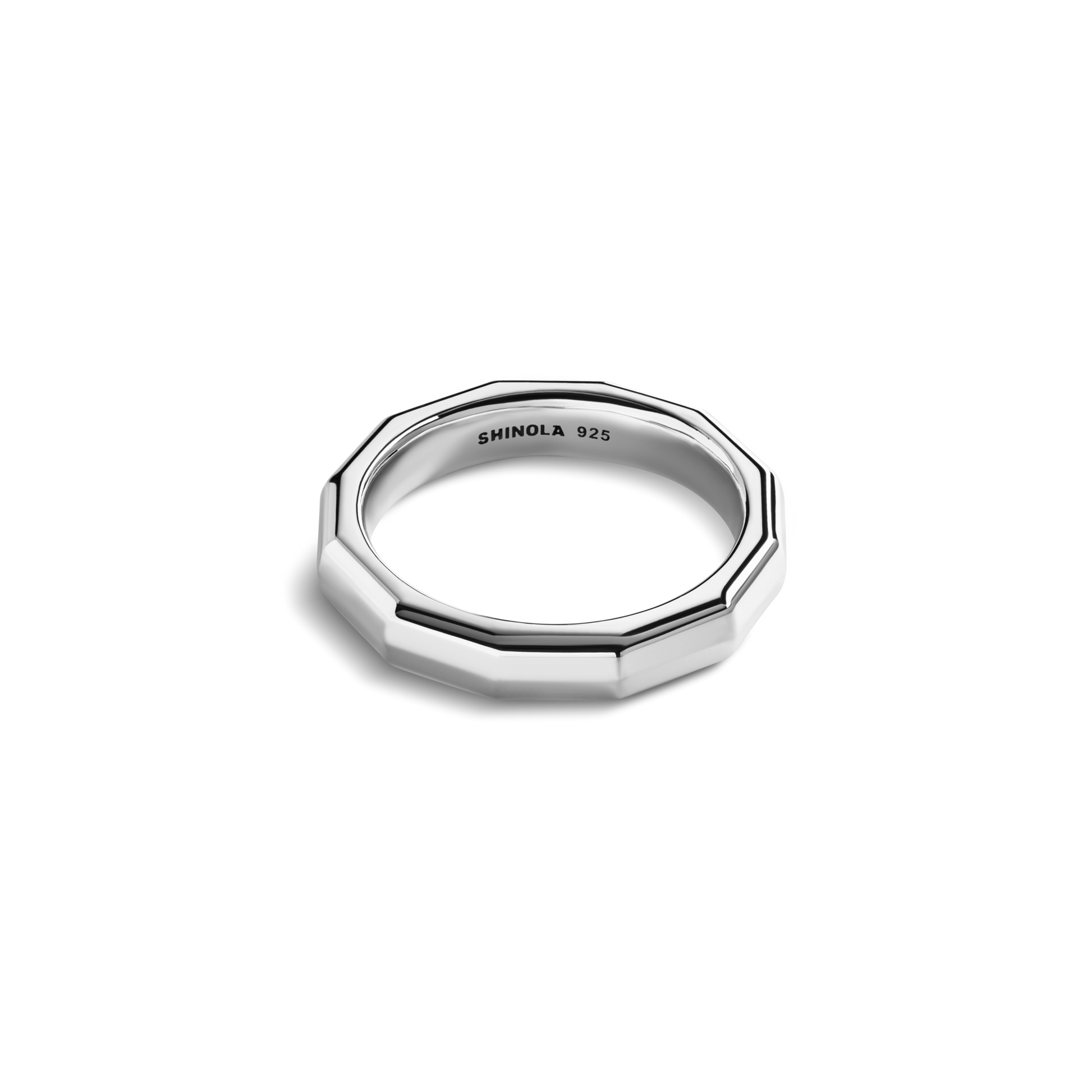 The Shinola 5mm Geometric Band is a sterling silver octagonal ring engraved with SHINOLA 925 on the inner side, showcased against a white background—a sleek modern accessory.