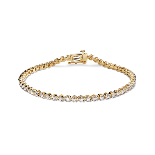 The Shinola 1 Carat 7" Diamond Tennis Bracelet in yellow gold features a single row of brilliant-cut diamonds and a secure box clasp, shown against a plain white background.