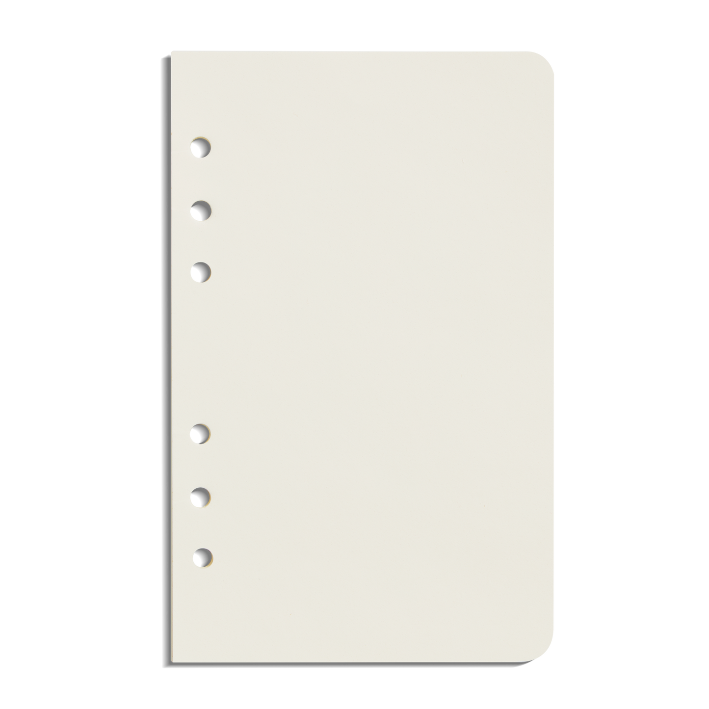 A single Plain Agenda Insert - Kraft by Shinola, off-white with six holes on the left and a rounded top right corner, ideal for your Refillable Leather Agenda, shown vertically against a white background.