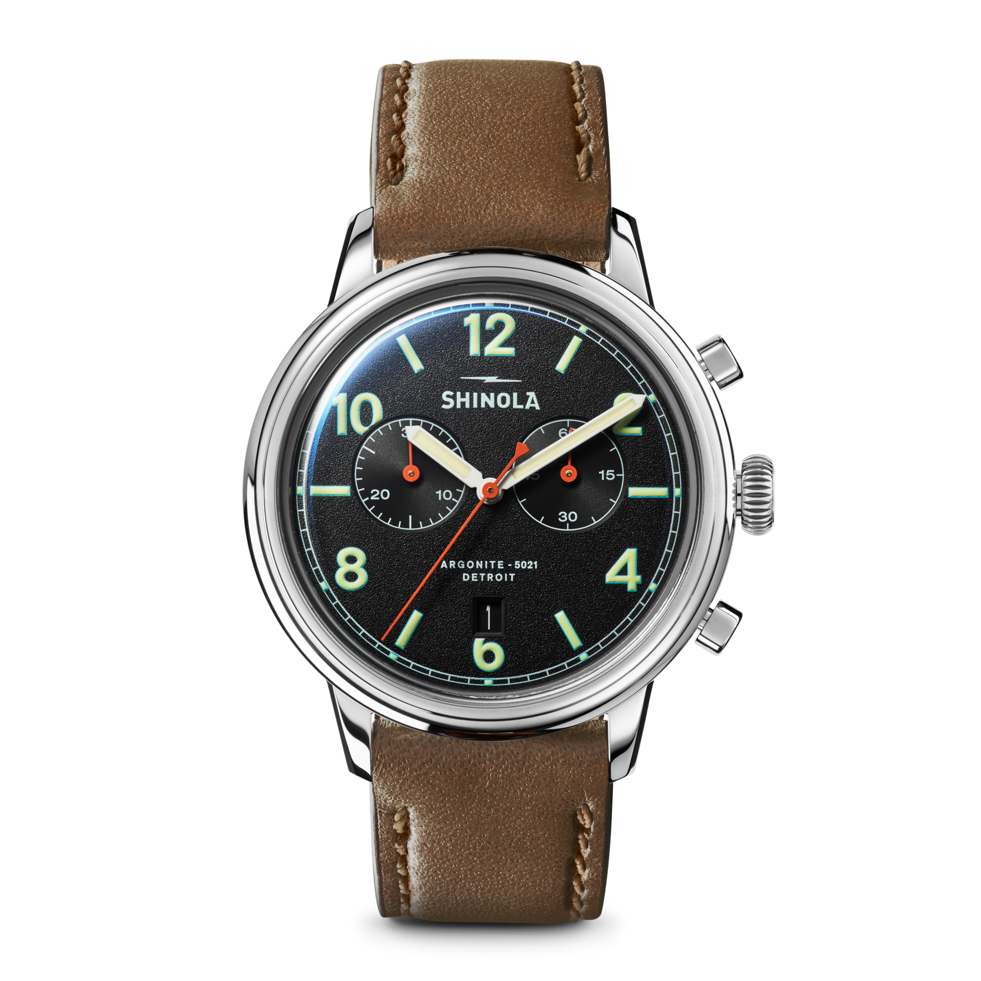 The Shinola Traveler Chronograph Watch - Black features a black dial, silver case, brown leather strap, neon green hour markers, two subdials, and orange, green, and white hands.
