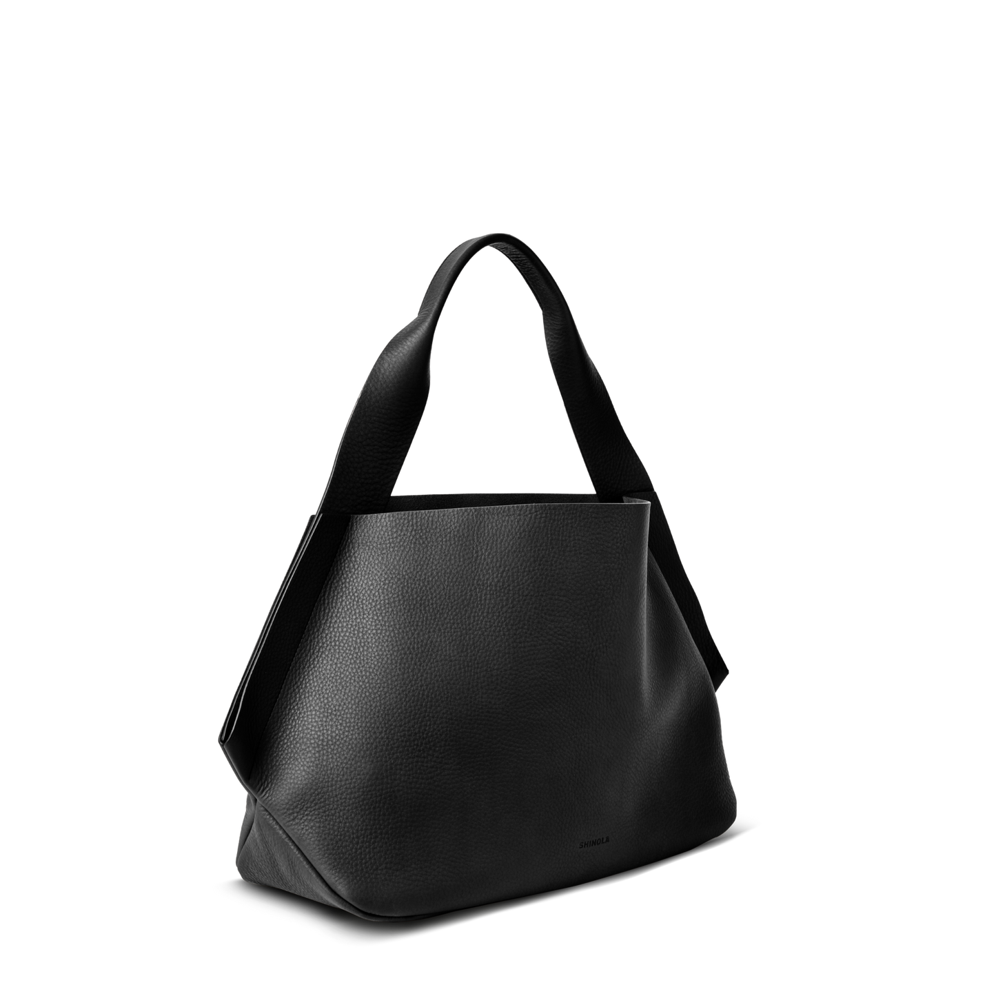 The Shinola Derby Shoulder Bag - Black is shown against a white background, highlighting its minimalist design with wide flat handles, textured surface, a spacious main compartment, and an inner leather card pocket.
