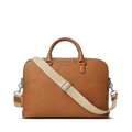The Shinola Double Zip Briefcase - Tan, crafted from natural grain leather, features short handles, a detachable beige shoulder strap, an extra compartment, silver hardware, and a simple elegant design against a white background.