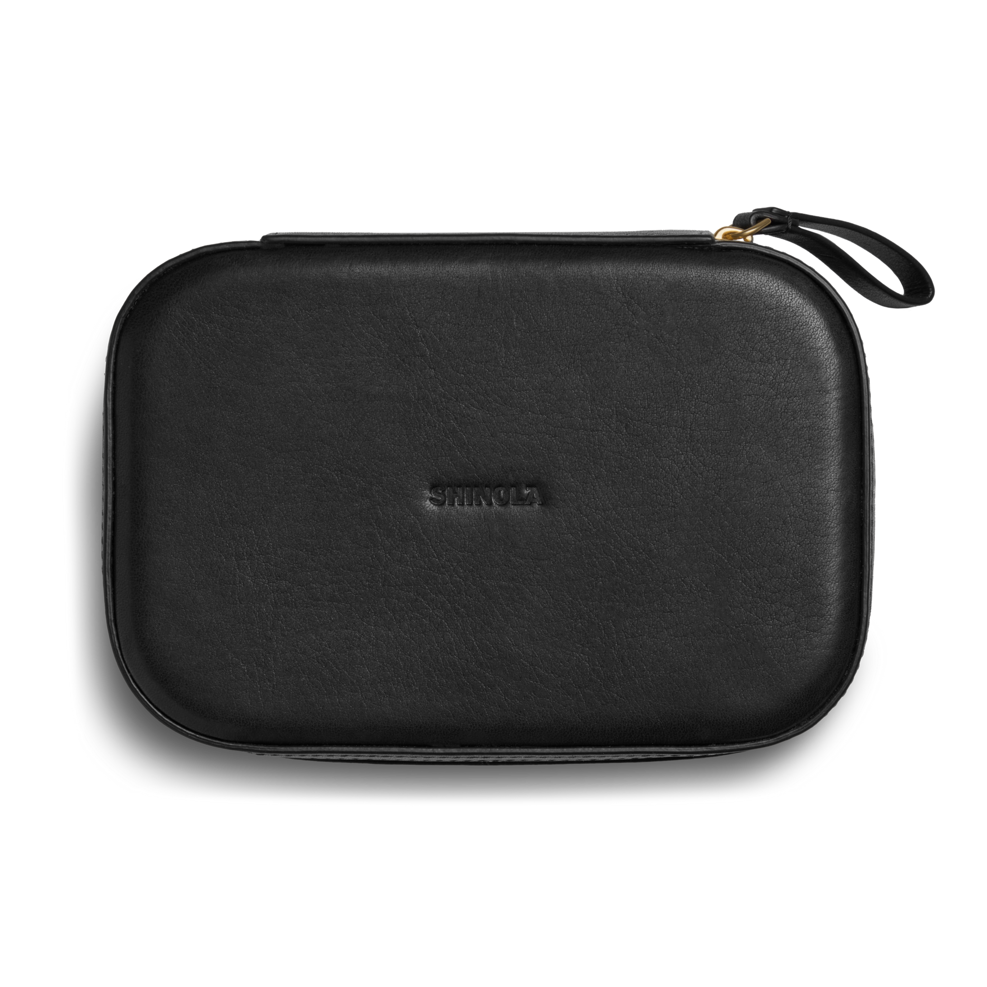 The Shinola Travel Jewelry Case - Black features a rectangular leather design, zippered closure, small top-right handle, and SHINOLA embossed at the center—perfect as a stylish travel jewelry case.