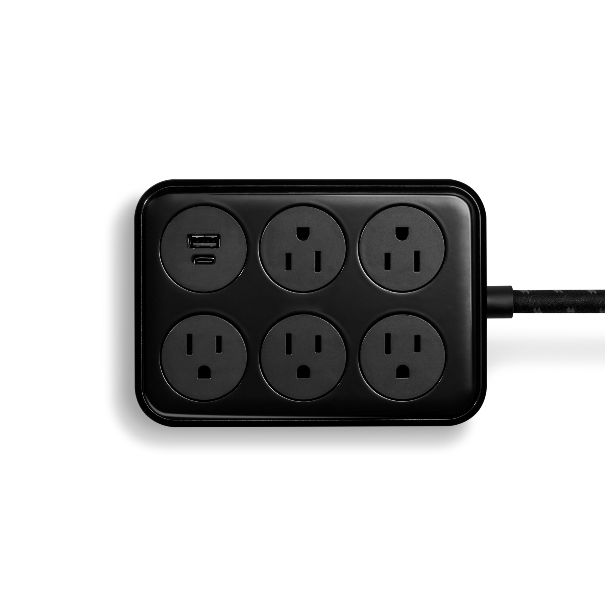 The Shinola 5 Port Power Supply - Black features six round outlets, USB-A and USB-C ports, and a braided extension cord, set against a plain white background with the cord extending from the right side.