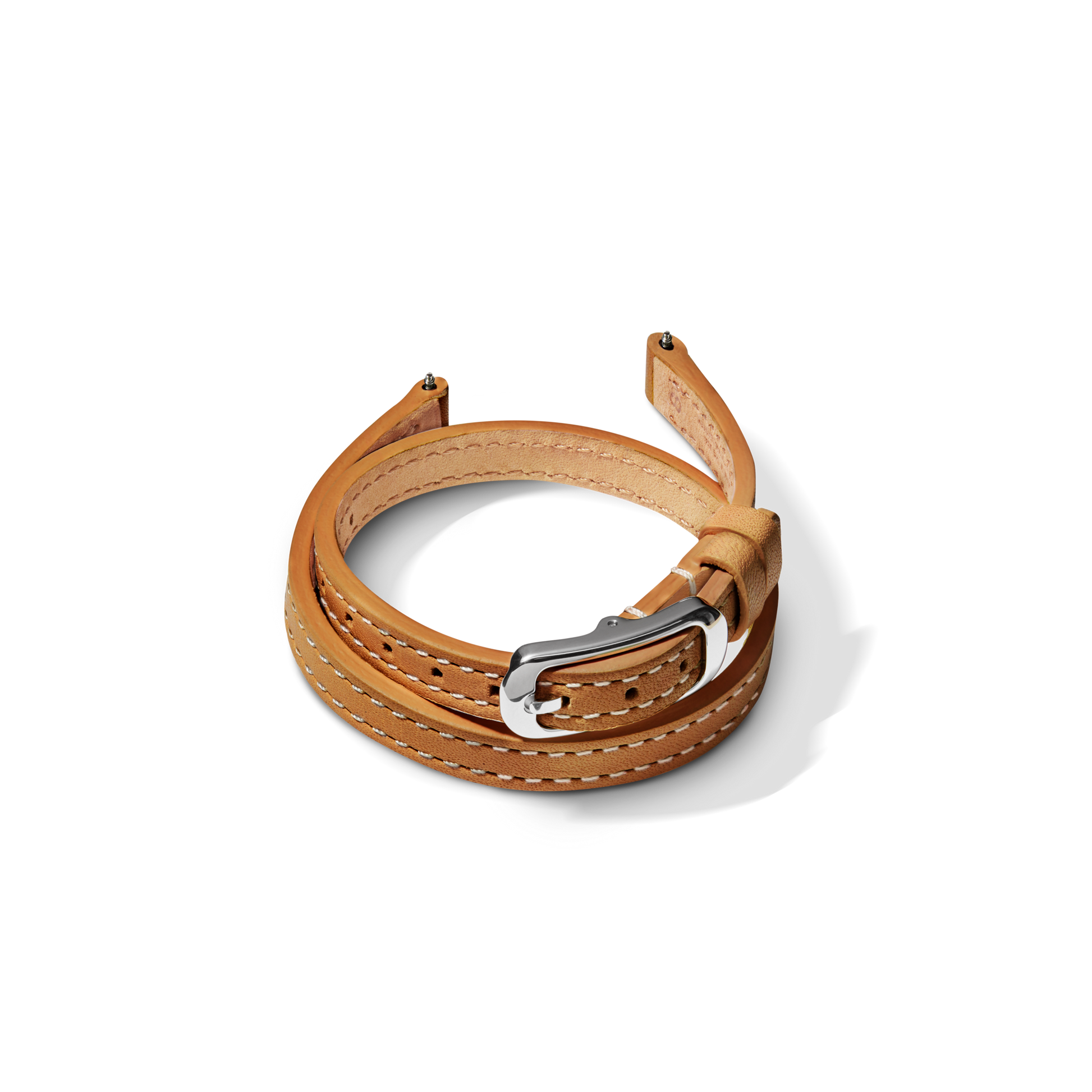 The Shinola 8mm Bourbon/Blush Reversible Leather Strap in Bourbon/Blush, shown coiled on a white background. Features a silver buckle and white stitching. Compatible with the 34mm Birdy; check sizing for the perfect fit.