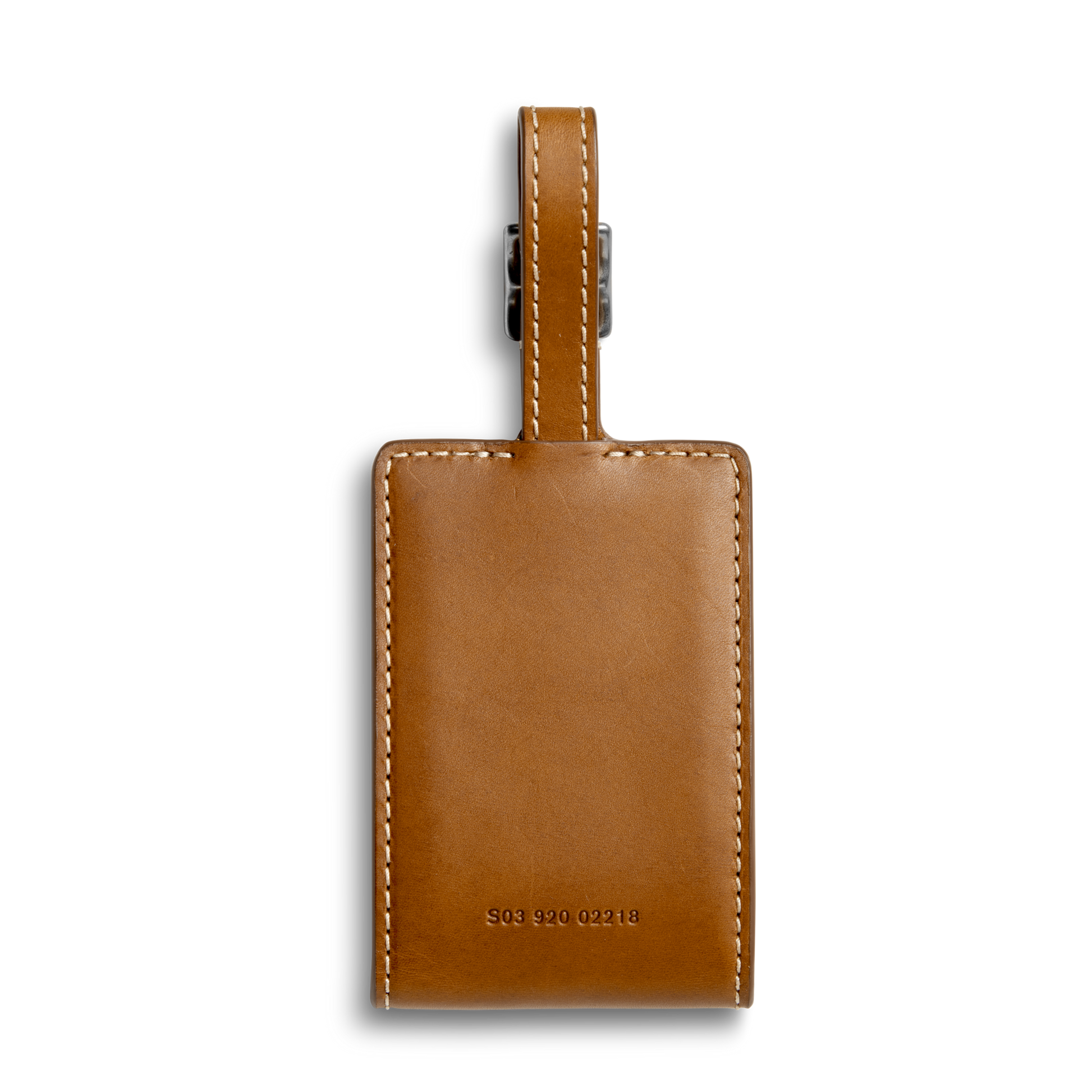 The Shinola Luggage Tag - Tan is crafted in brown Italian leather with white stitching, an attachment strap, and embossed numbers on the front—a refined detail ideal for monogramming.