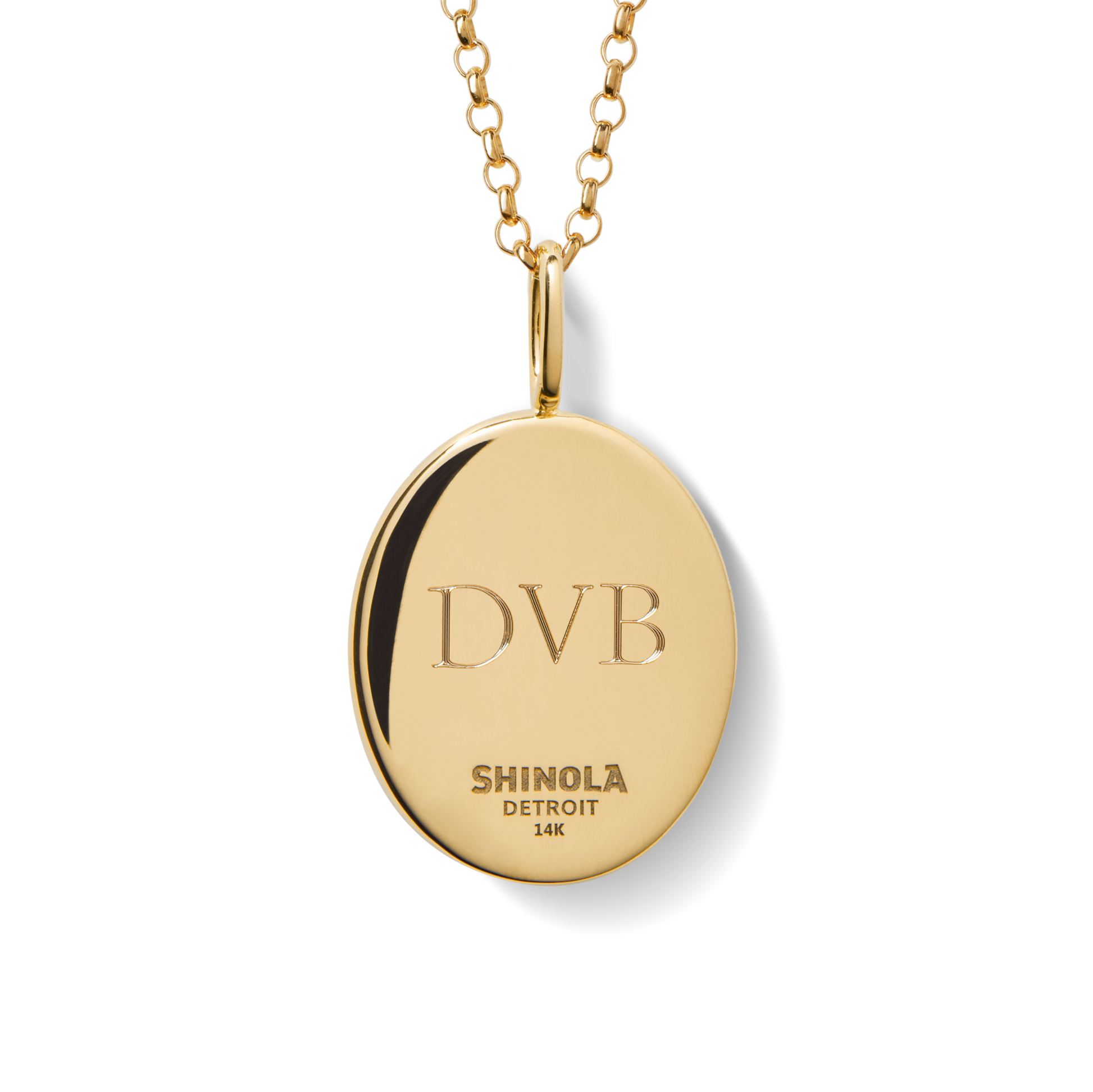 The Diamond Pave Lapis Pendant Necklace in yellow gold by Shinola features a polished pendant, perfectly blending elegance and shine.