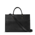 The Shinola Day Satchel - Black is a structured, rectangular bag in sleek black leather with gold hardware, two short handles, and a long adjustable shoulder strap—perfect as an on-the-go accessory against a white background.