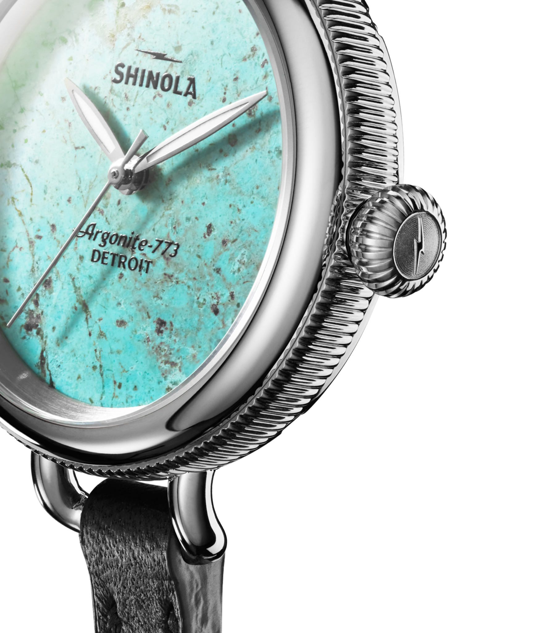 Close-up of the Shinola Birdy Watch - Chrysocolla, featuring a chrysocolla stone dial, silver-toned case, and black leather strap. The dial displays Shinola, Argonite-773, and Detroit text.