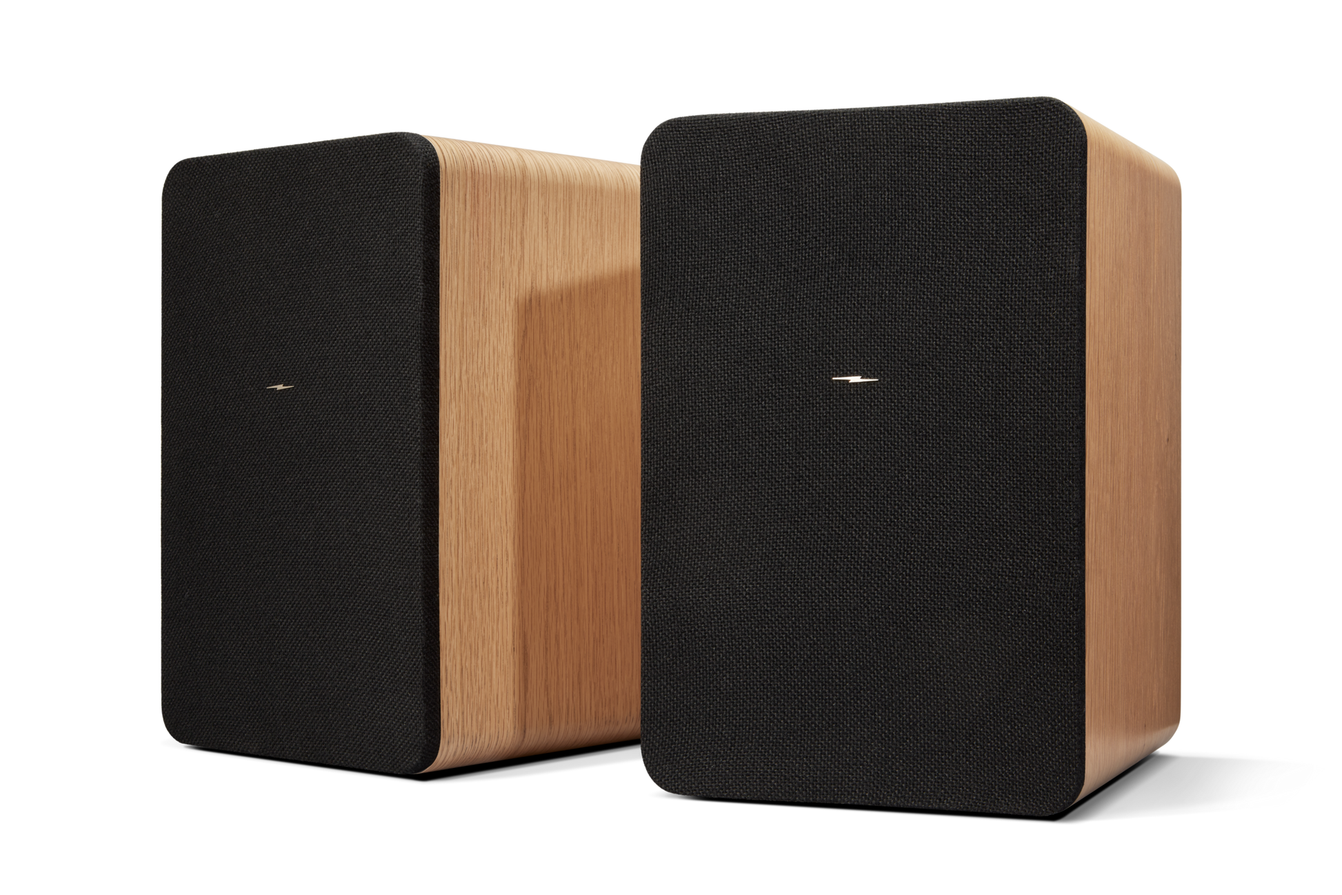 Two rectangular Shinola Bluetooth Bookshelf Speakers - Natural, featuring light wood sides and black fabric fronts with a centered logo, are placed side by side against a white background.