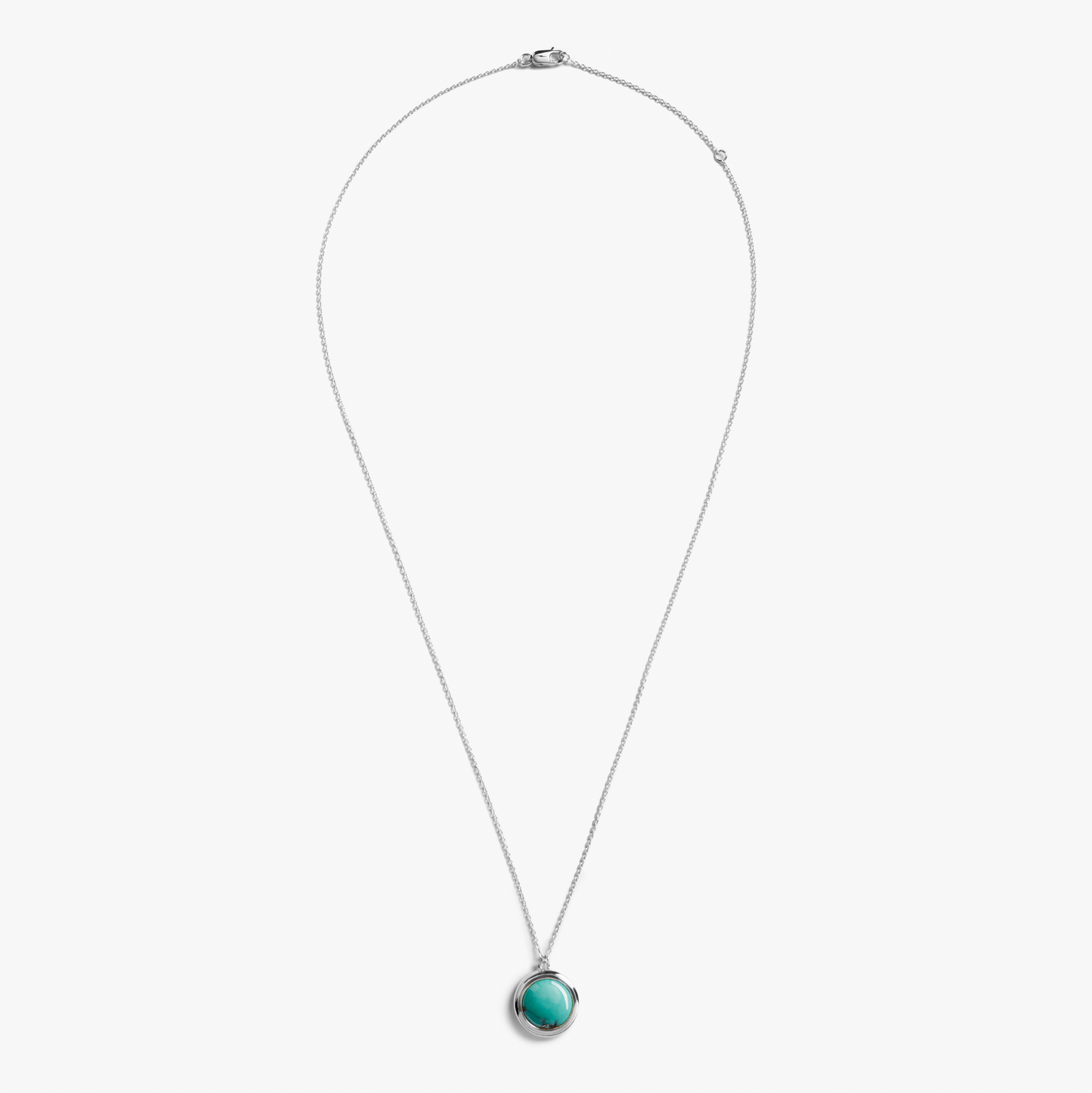 The Heirloom Turquoise Pendant Necklace by Shinola features a sterling silver thin chain and a round turquoise pendant in a simple bezel, shown on a plain white background.