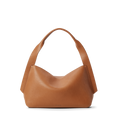 The Shinola Medium Derby Shoulder Bag - Tan, made from natural grain leather with wide rounded handles and a relaxed hobo silhouette, is shown on a plain white background.
