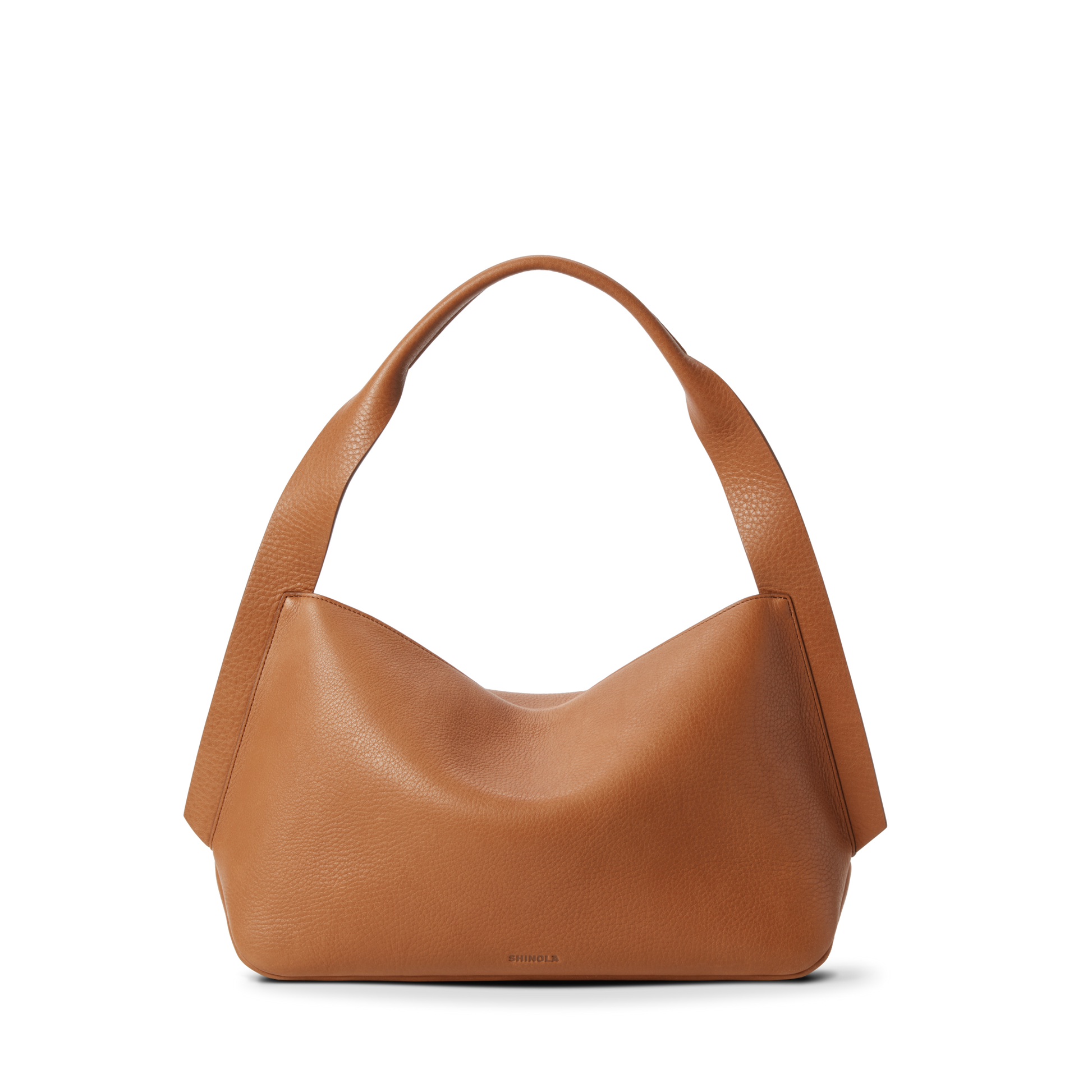 The Shinola Medium Derby Shoulder Bag - Tan, made from natural grain leather with wide rounded handles and a relaxed hobo silhouette, is shown on a plain white background.