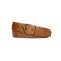 The Shinola 1 1/2" Rambler Belt in tan bridle leather features a brass buckle and is shown coiled on a plain white background.
