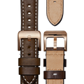 The Shinola QR Strap: 20/18 Smooth Essex, CN, TT Classic, BrBrz - Deep Brown features brown leather with white stitching, a gold-toned buckle, and beige underside. Shown from both sides to highlight the stitching and buckle details.
