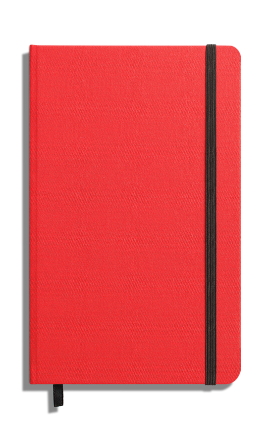 The Shinola Medium Hard Ruled Journal in Tomato features a closed red linen cover with a black elastic band on the right edge and a black ribbon bookmark, shown on a white background.