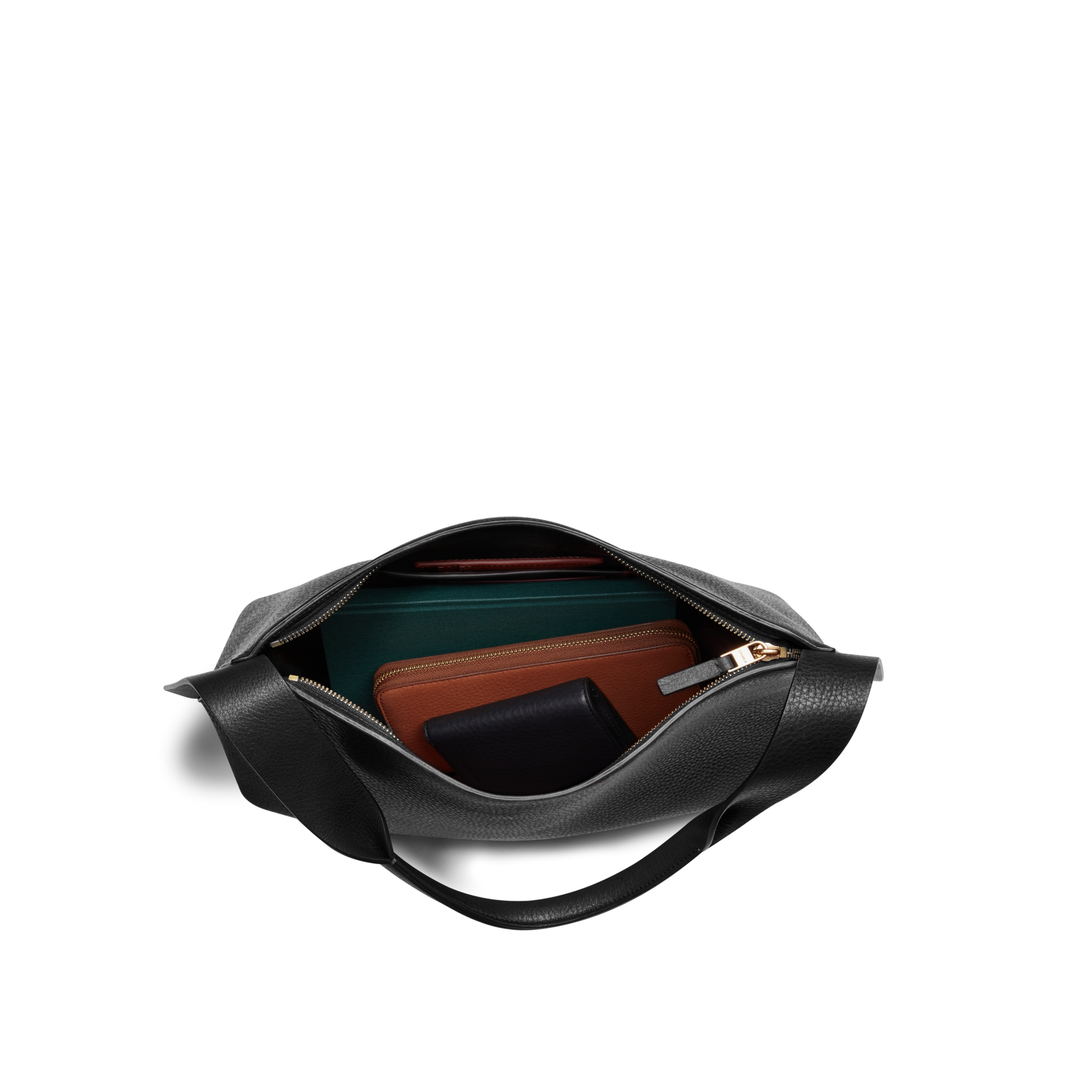 A black Shinola Medium Derby Shoulder Bag, shown from above with its zip open, displays neatly organized wallets and small items inside against a white background.