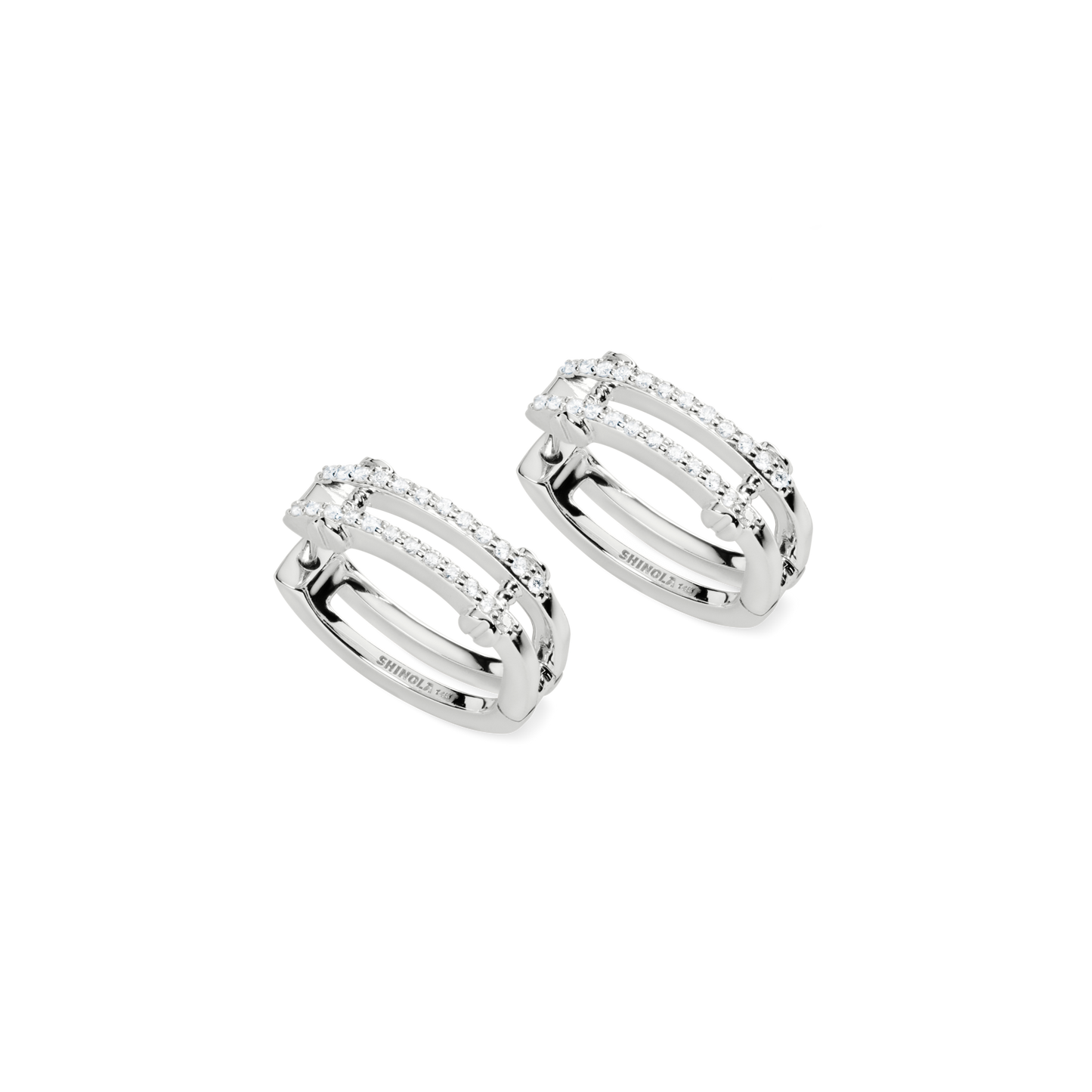 From Shinola’s Rivet Collection, the Diamond Pave Rivet Double Row Hoop Earrings in 14k white gold feature two rows of sparkling diamonds and a polished finish—an elegant upgrade for any look.