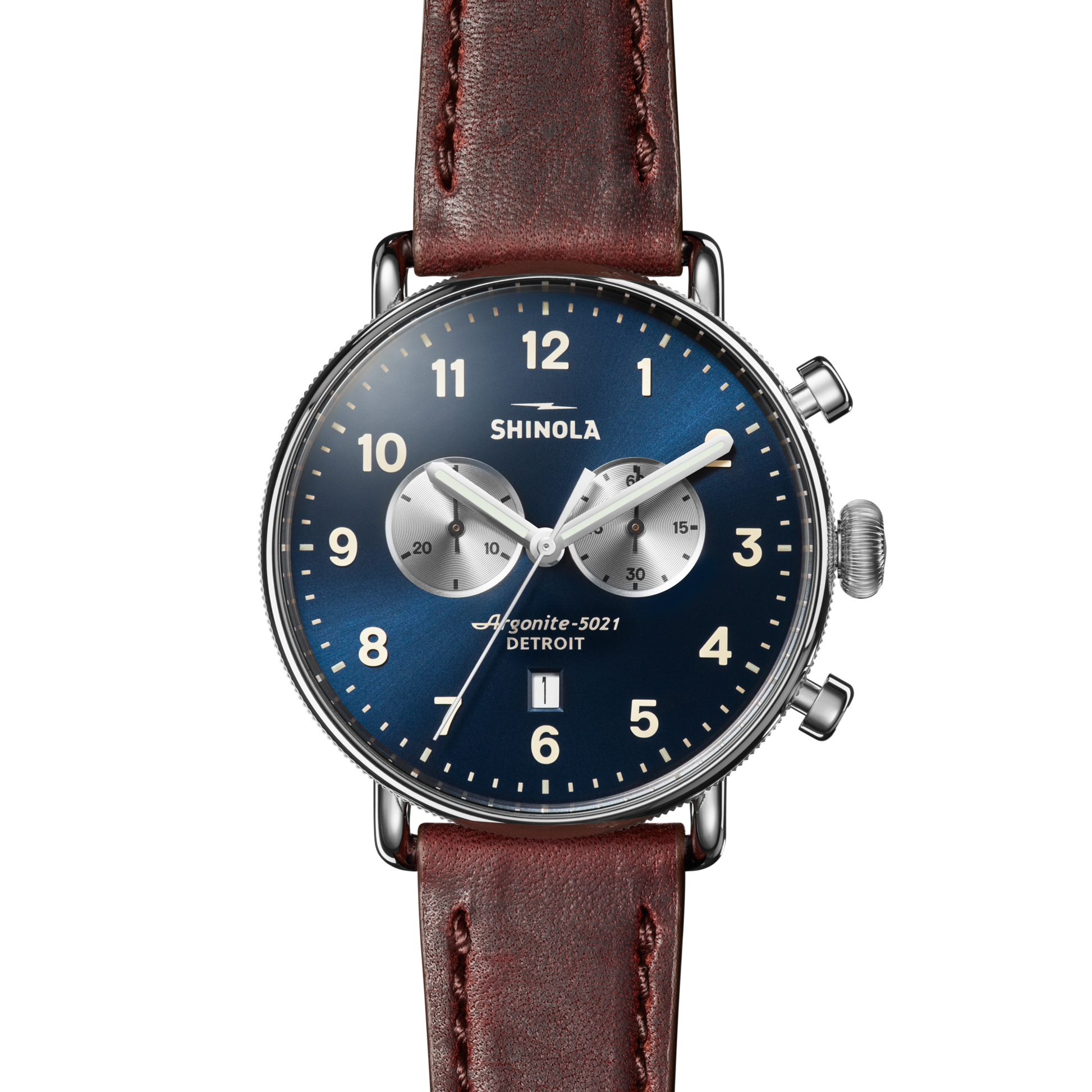 The Shinola Canfield Chronograph Watch with a cattail leather strap features top loaded case construction, a blue dial with silver subdials, white numerals, and is displayed against a white background.