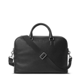 The Shinola Double Zip Briefcase - Black features natural grain leather, two top handles, a detachable shoulder strap, silver hardware, and an extra compartment, shown against a plain white background.