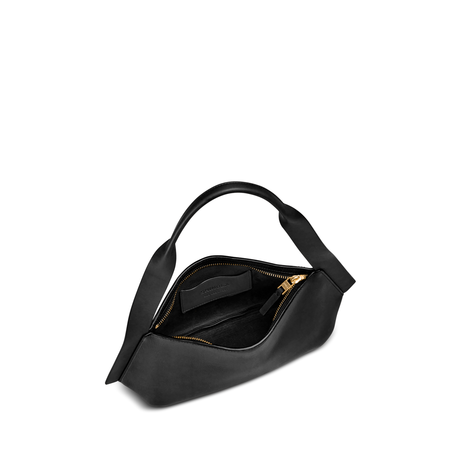 The Shinola Small Derby Shoulder Bag in black features a soft natural leather build, asymmetrical shape, short handle, gold zipper, and interior pocket, presented open against a plain white background.