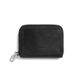 The Shinola Pocket Small Zip Around Wallet in black natural leather features a minimalist design, embossed "Shinola Detroit" on the front, and a silver zipper pull. It is photographed against a plain white background.
