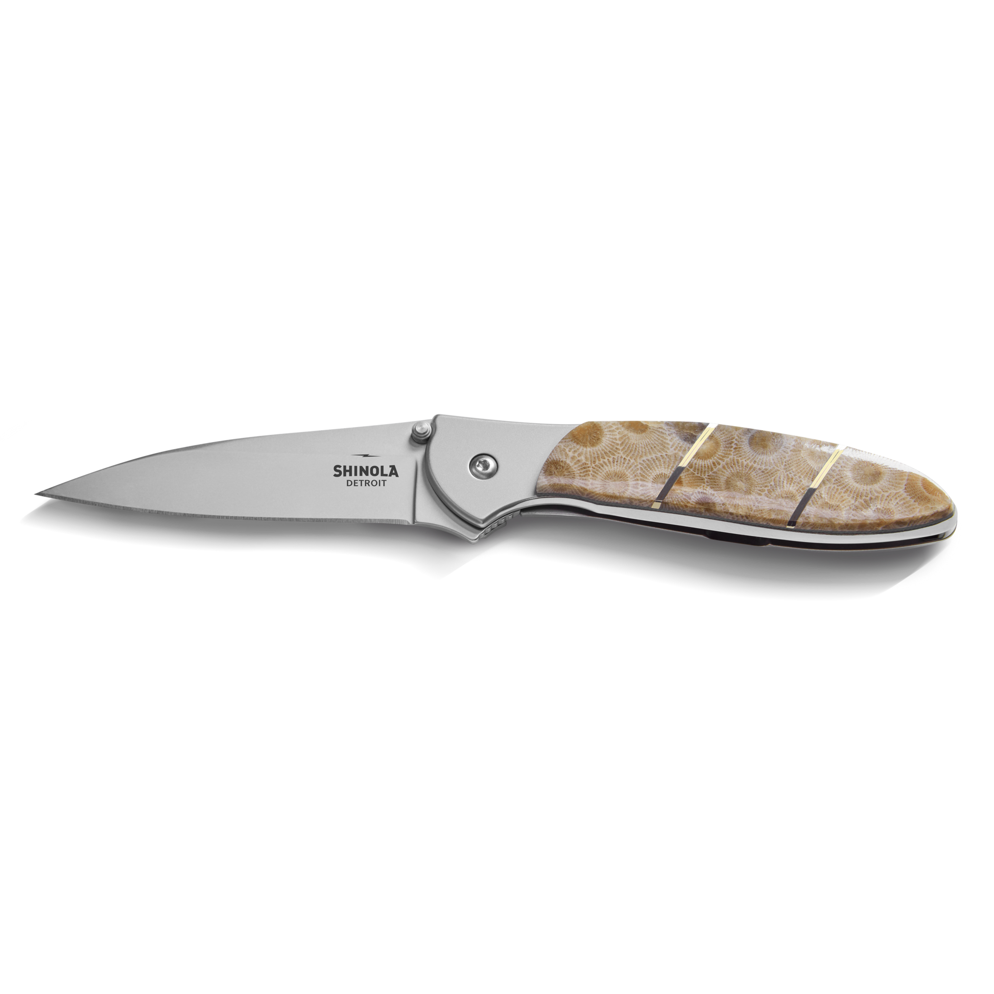 The Shinola + Kershaw Petoskey Stone Pocket Knife - Petoskey features a silver blade and a brown patterned handle with two thin gold bands, shown open against a white background.
