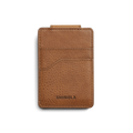 The Magnetic Money Clip Card Holder - Tan by Shinola features two credit card slots, a textured leather finish, and an embossed brand name. Shown on white background; monogramming available for personalization.