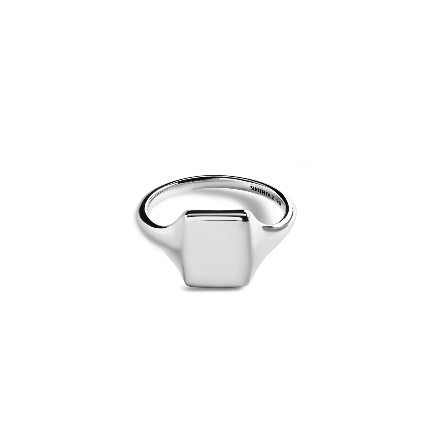 The Shinola Petite Rectangular Signet Ring, crafted in sterling silver, is displayed against a white background. Its smooth rectangular face and subtly engraved interior make this monogrammed ring timeless and personal.