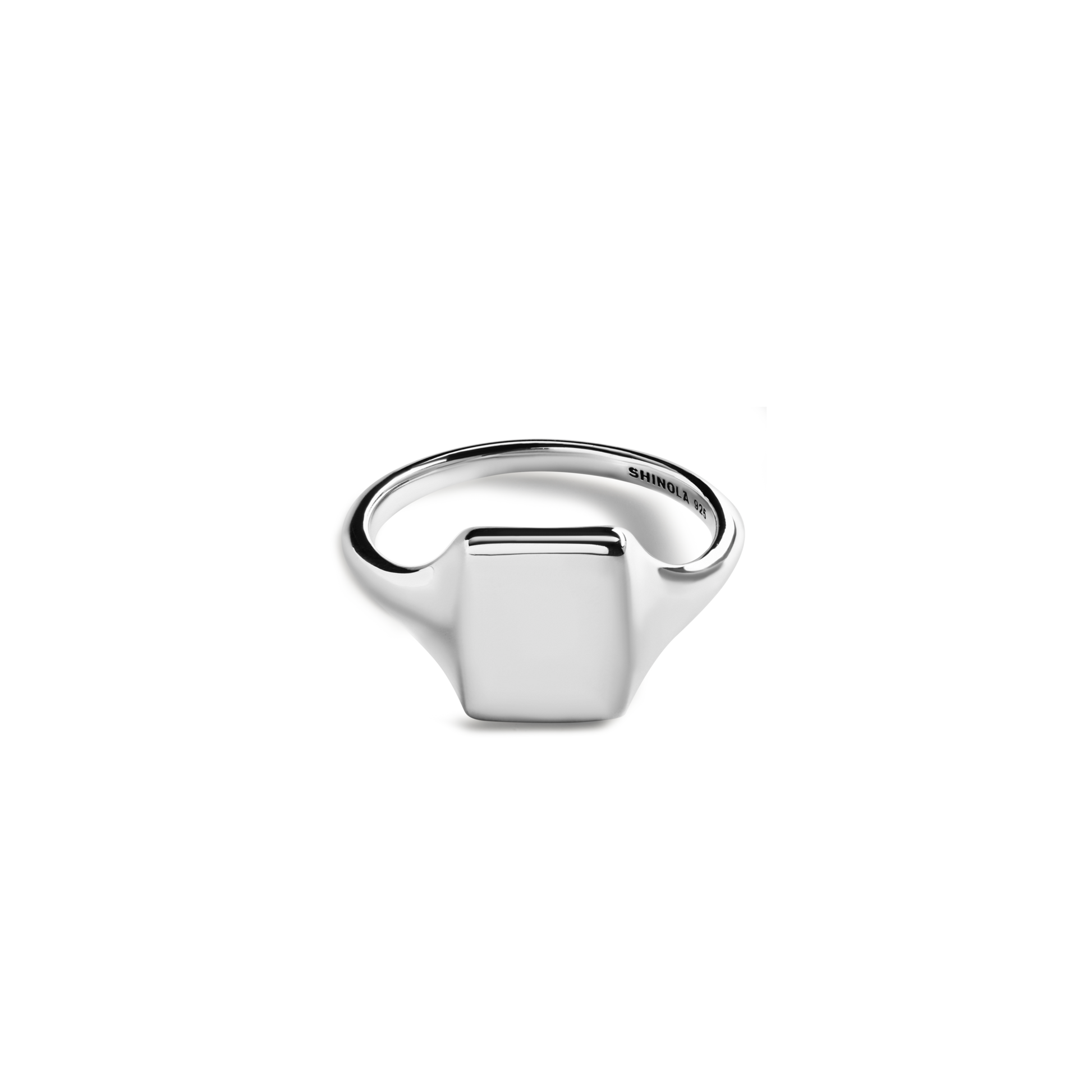The Shinola Petite Rectangular Signet Ring, crafted in sterling silver, is displayed against a white background. Its smooth rectangular face and subtly engraved interior make this monogrammed ring timeless and personal.