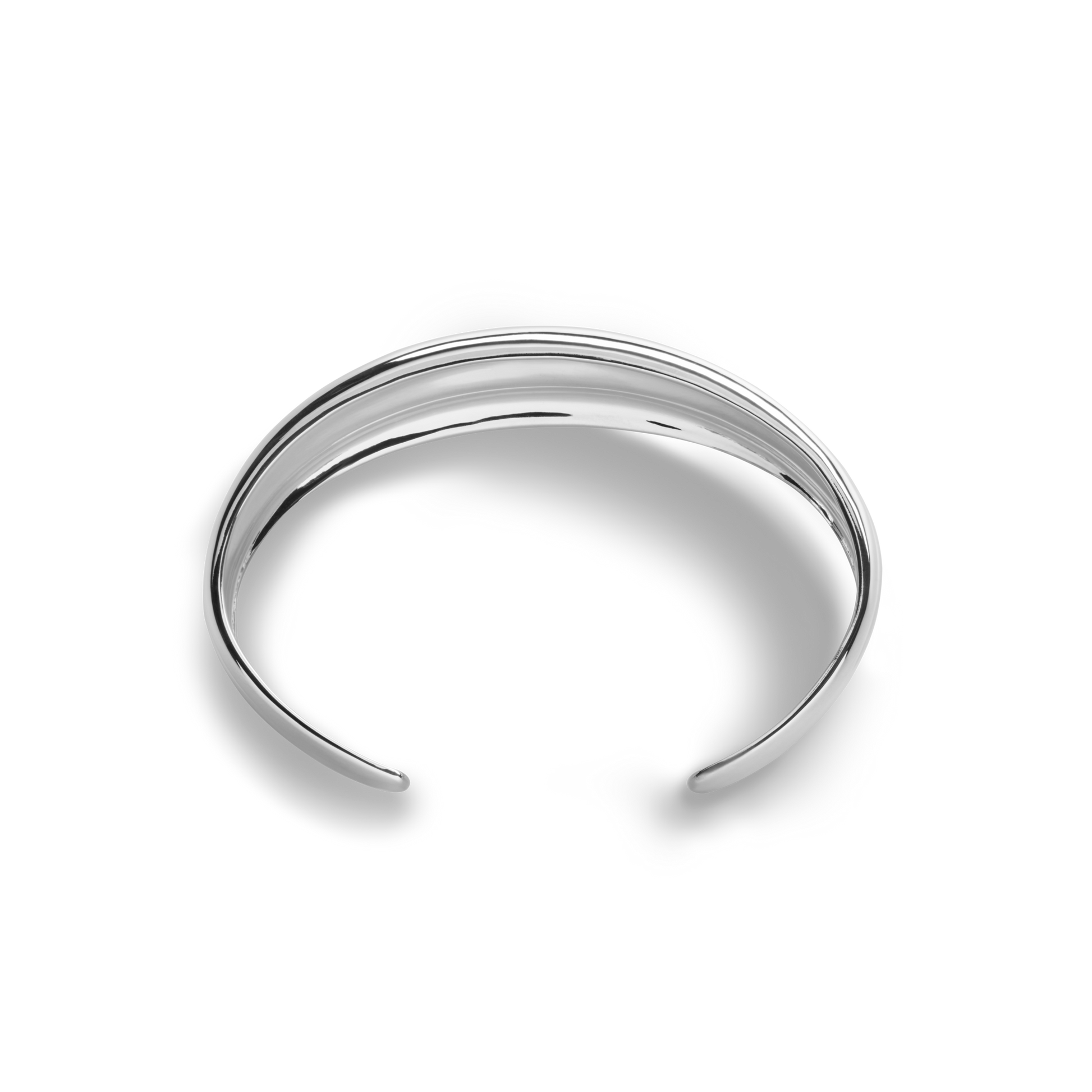 The Shinola Signature Silver Statement Cuff is a sleek, polished sterling silver bracelet with a smooth, gently curved design, displayed on a plain white background.