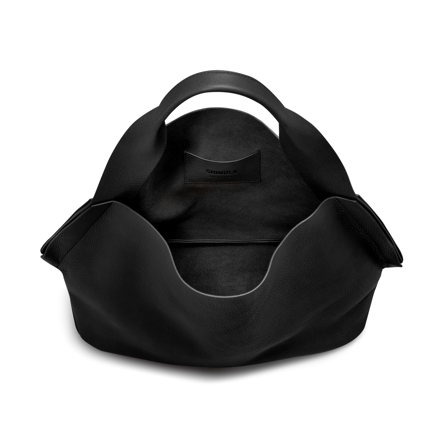 The Shinola Derby Shoulder Bag - Black is a large tote featuring curved handles, a wide open top, and a leather card pocket in its spacious main compartment, shown against a plain white background.