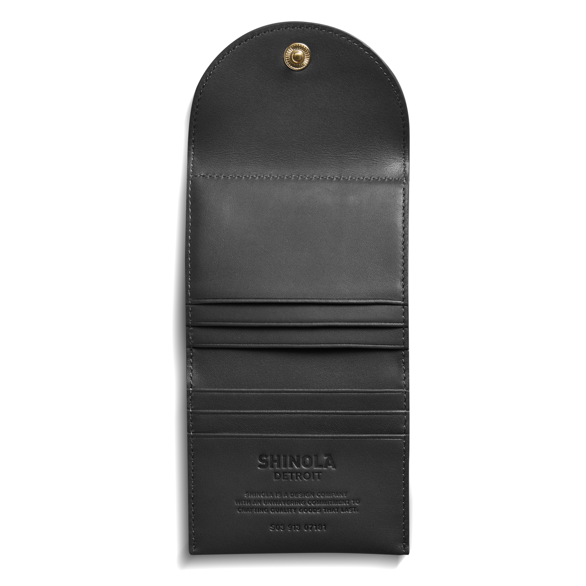 The Birdy Small Snap Wallet - Black by Shinola features black leather, an open flap with gold snap button, multiple card pockets, and embossed branding inside.