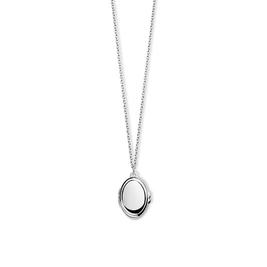 The Shinola Heirloom Petite Locket Necklace in sterling silver features a circular pendant with a minimalist concentric ring design, shown on a plain white background.