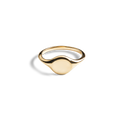 The Shinola Petite Round Signet Ring - Yellow Gold features a smooth, oval face in 14k gold, offering timeless elegance. Photographed on a white background.