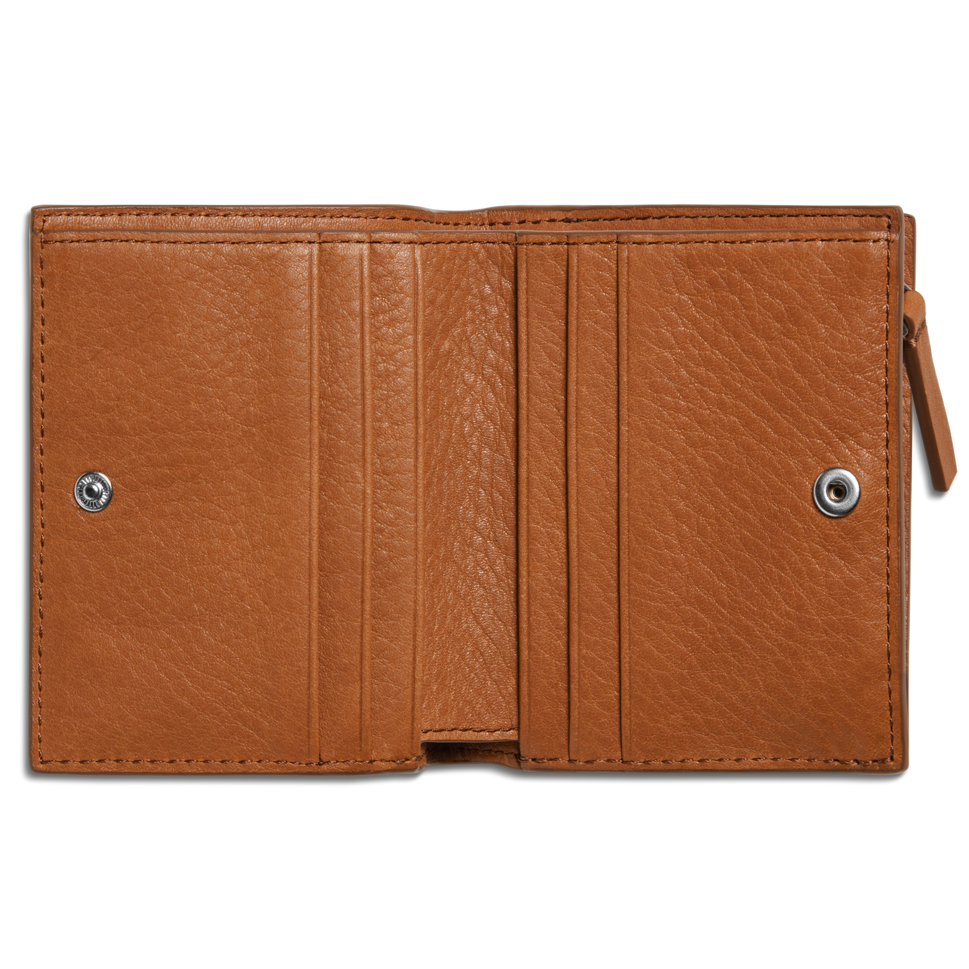 The Shinola Coin Bifold - Tan is a slim wallet crafted from natural grain leather with a textured surface. When open, it reveals card slots, a right-side zip coin pocket, and metallic snap closures on both sides.