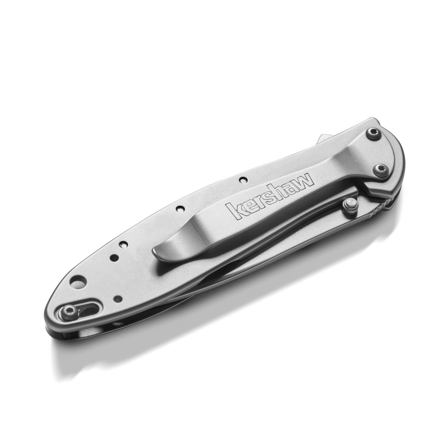 A closed Shinola + Kershaw Petoskey Stone Pocket Knife - Petoskey with a metal clip and "kershaw" engraved on the handle, shown on a plain white background.