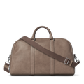 The Shinola Runwell Duffle Bag - Stone features natural grain leather in taupe, two handles, an adjustable brown shoulder strap, silver hardware, and a subtle embossed logo. This minimalist carry-on offers modern style.